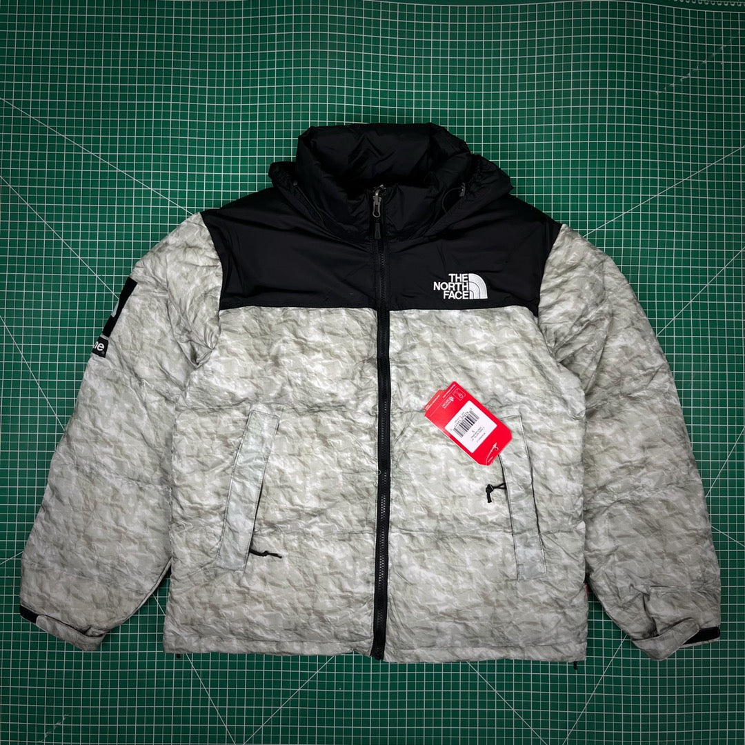 SUPREME X TNF PAPER PRINT NUPTSE JACKET – HEART EYEZ OTS